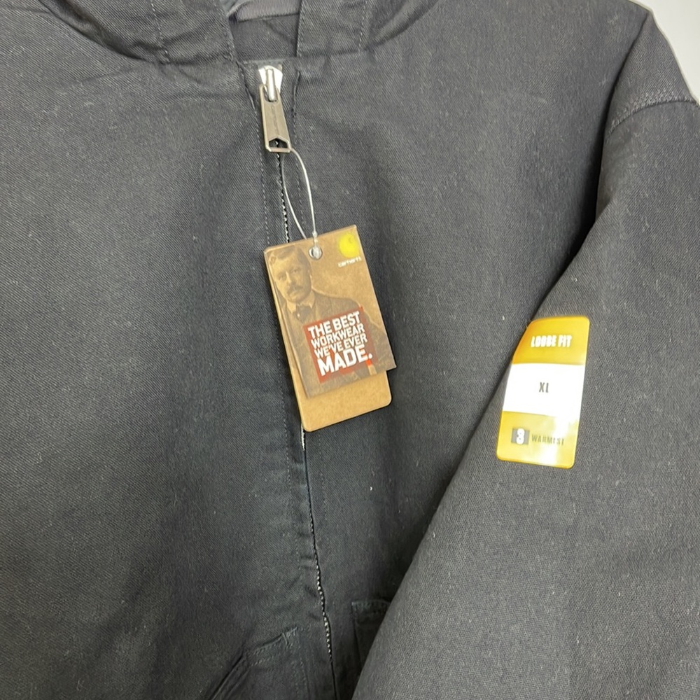 Brand New with tags. Carhartt mens warm work coat. Never worn, has a hood too!